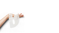 The two-piece hydrogel collagen mask held up against a black background