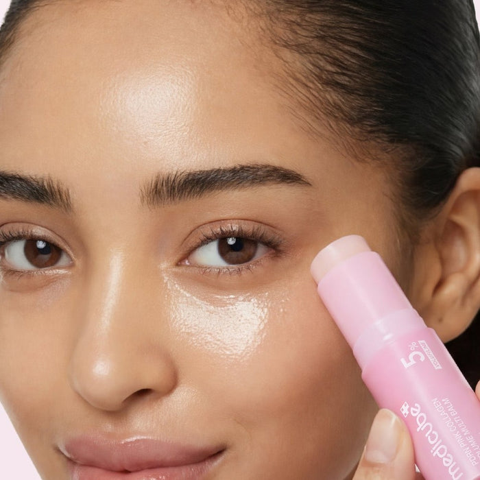 Medicube PDRN pink collagen balm glided onto the cheek