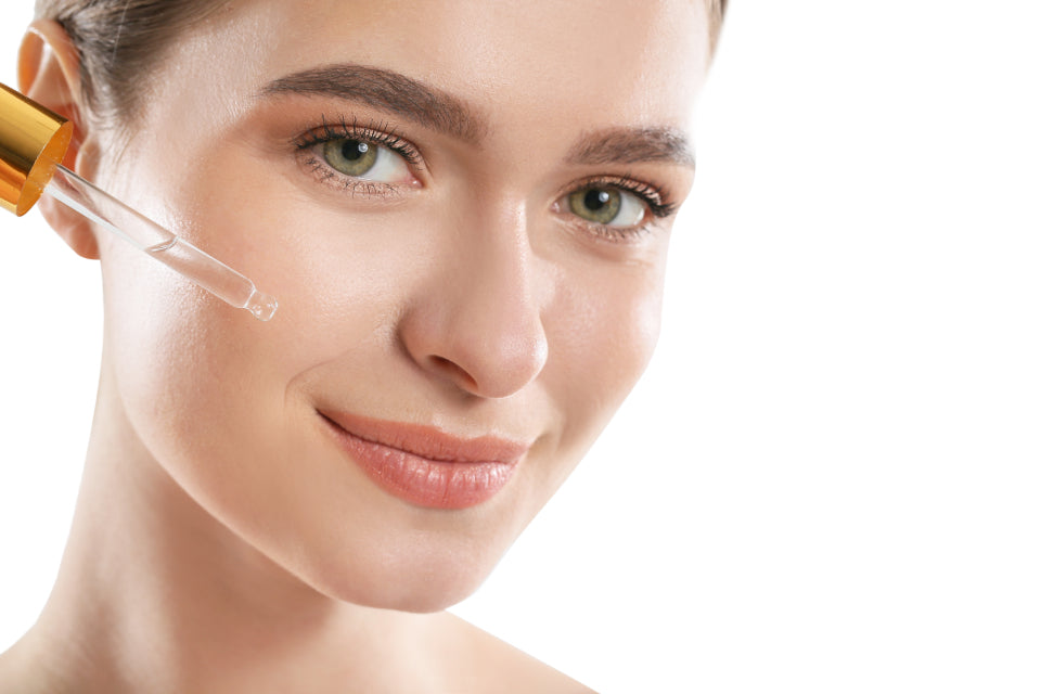 Serum applied to clear glowing skin