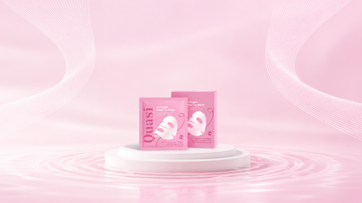 Two Quasi mask boxes on a pale pink podium