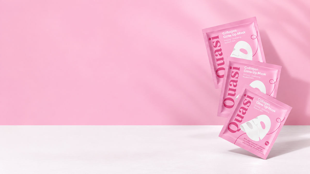 Quasi mask sachets arranged against a pink background